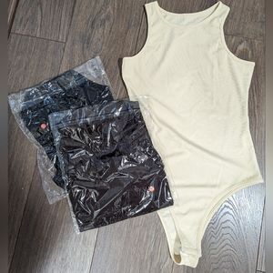 AMAZON QQQ - 3 pack high neckline bodysuits. Size medium. Beige, brown and black
